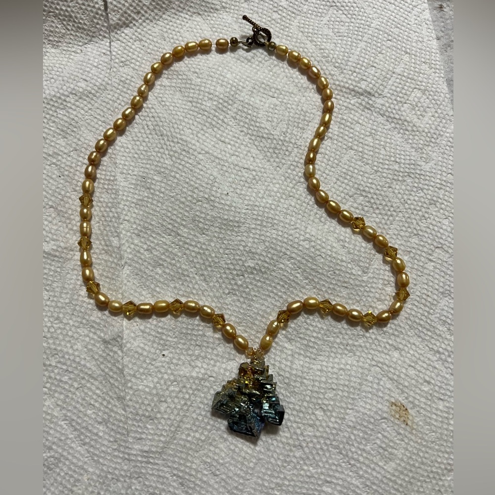 Titanium pendant with beaded necklace